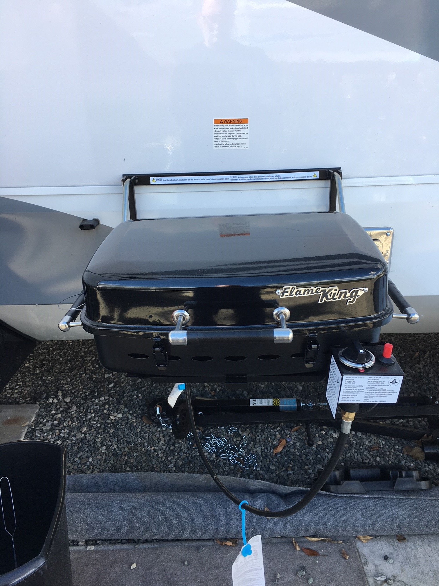 Uncovered RV Grill, posing risk to vehicle